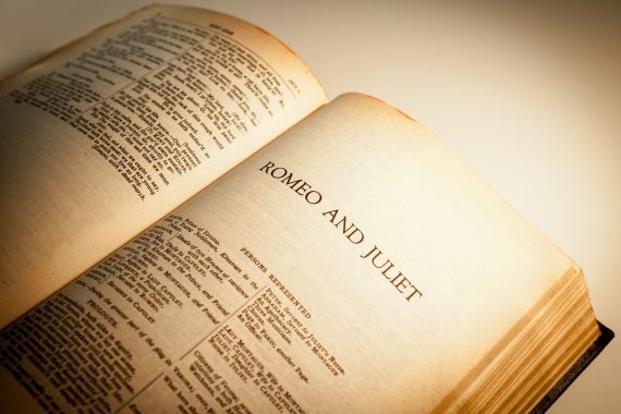 Old book open on first page of Romeo and Juliet